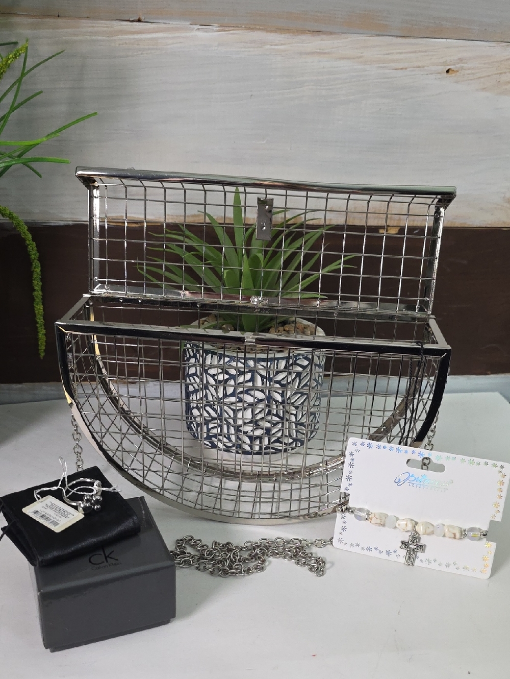 Unique bag, CK paw ring and stone cross bracelet